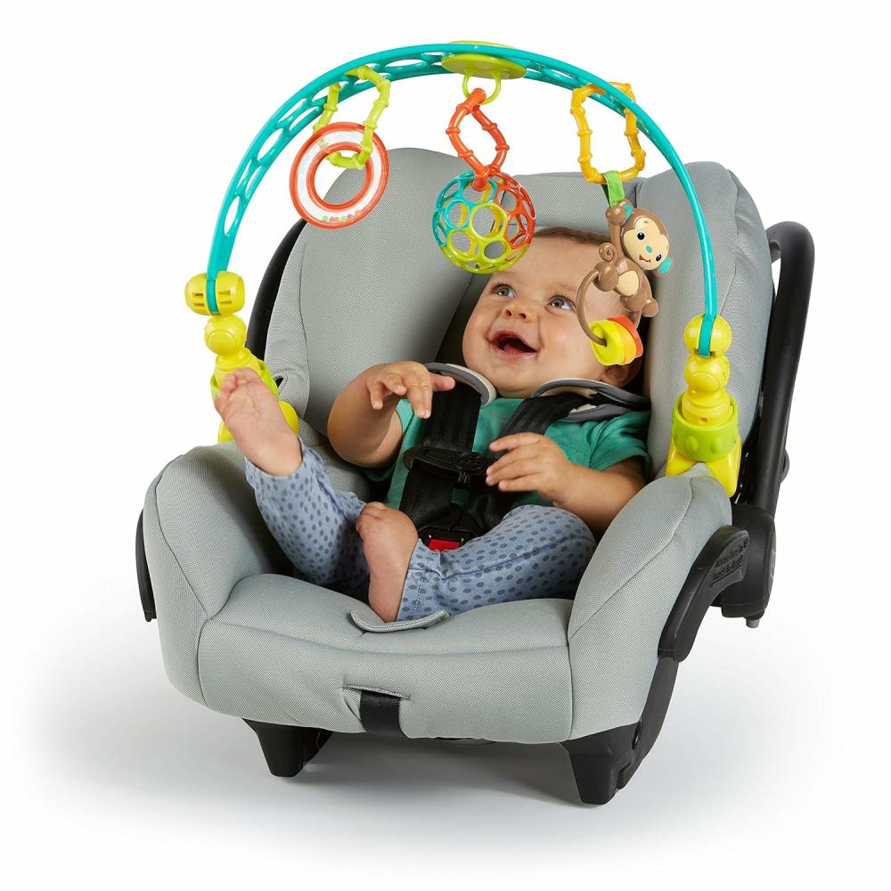 Jouets pour siège auto et poussette  | Oball Flex ‘N Go Arche d’Activité Poussette ou Porte-Bébé Jouet à Emporter Âges Nouveau-né +